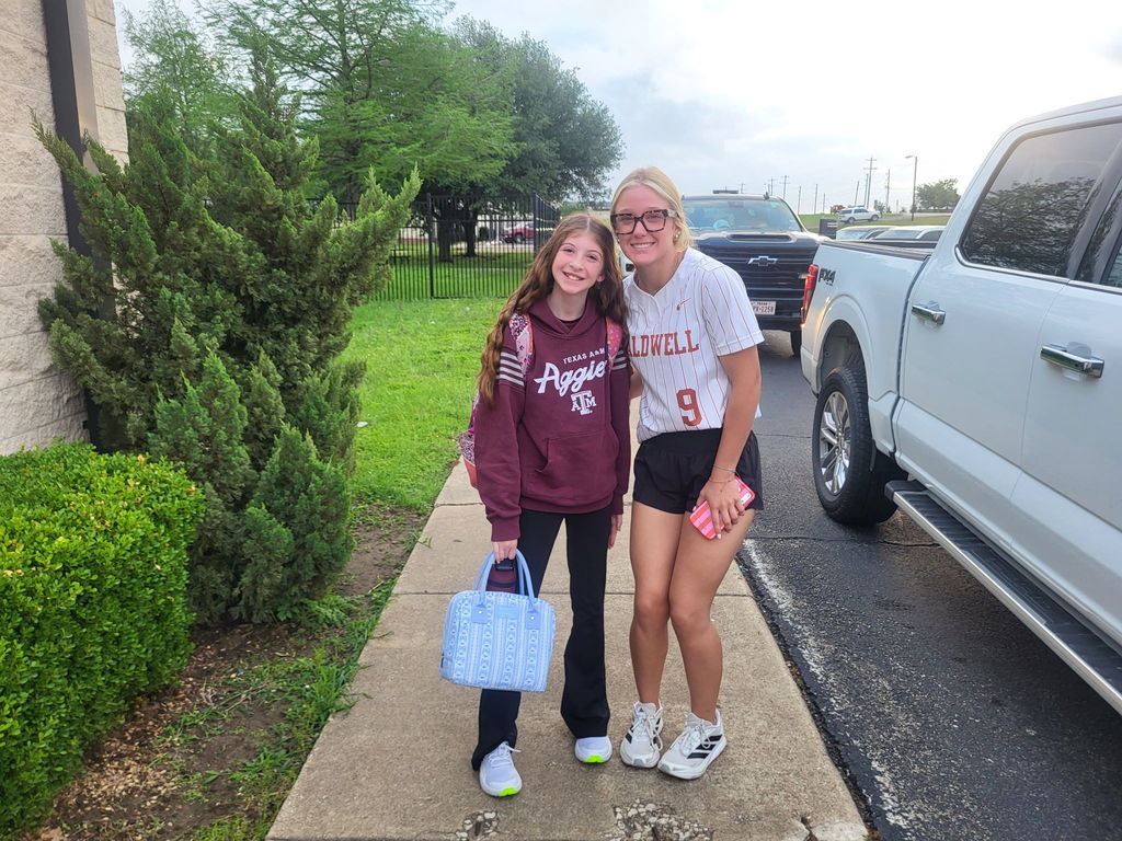 Serving smiles this morning… bringing the heat tomorrow 🔥  Our Lady Hornets kicked off the day at CIS opening car doors and greeting students—because that’s what it means to be a Hornet.  Next stop: PLAYOFFS. 🥎 Round 1 starts tomorrow—let’s go!! #CaldwellProud #CaldwellISD