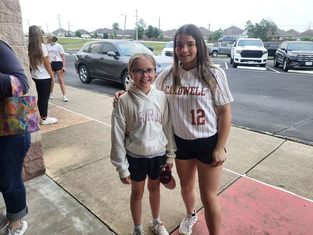 Serving smiles this morning… bringing the heat tomorrow 🔥  Our Lady Hornets kicked off the day at CIS opening car doors and greeting students—because that’s what it means to be a Hornet.  Next stop: PLAYOFFS. 🥎 Round 1 starts tomorrow—let’s go!! #CaldwellProud #CaldwellISD