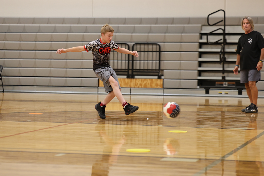 Option 3  ⚽️ Another great day at Soccer Camp!  From learning new skills to building confidence and teamwork, our campers have been putting in the work and having fun doing it. We can't wait to finish the week strong today! 🧡🖤 #StingEm