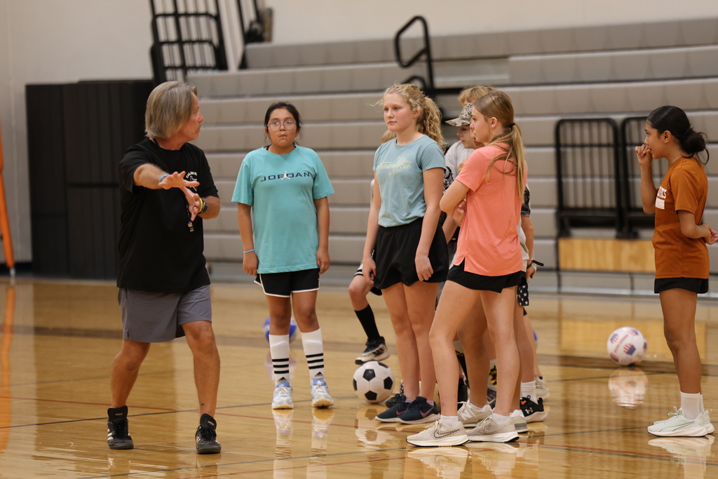 Option 3  ⚽️ Another great day at Soccer Camp!  From learning new skills to building confidence and teamwork, our campers have been putting in the work and having fun doing it. We can't wait to finish the week strong today! 🧡🖤 #StingEm