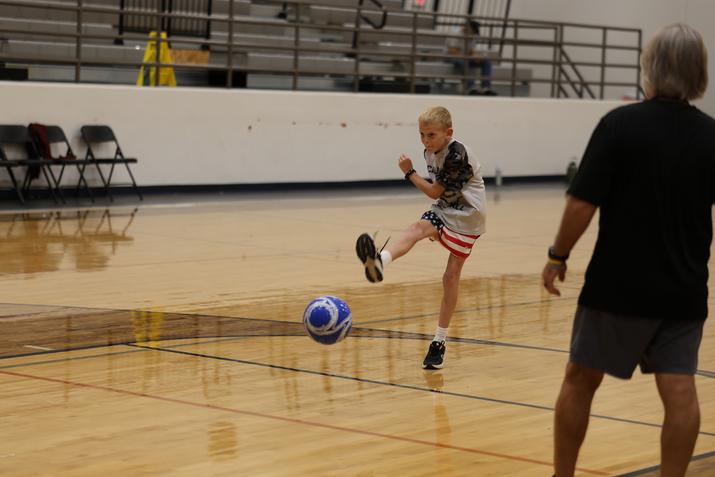 Option 3  ⚽️ Another great day at Soccer Camp!  From learning new skills to building confidence and teamwork, our campers have been putting in the work and having fun doing it. We can't wait to finish the week strong today! 🧡🖤 #StingEm