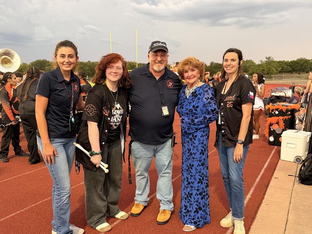 🧡 𝗢𝗡𝗖𝗘 𝗔 𝗛𝗢𝗥𝗡𝗘𝗧, 𝗔𝗟𝗪𝗔𝗬𝗦 𝗔 𝗛𝗢𝗥𝗡𝗘𝗧. 🧡  Friday night’s Homecoming was made extra special by a very special guest — 𝗦𝘁𝗲𝗽𝗵𝗶𝗻𝗮 (𝗡𝗮𝘃𝗿𝗮𝘁𝗶𝗹) 𝗗𝗶𝗗𝗼𝗻𝗮𝘁𝗼, Caldwell High School Class of 1951.  At 94 years young, Stephina traveled all the way from Delaware to come home to Caldwell. She spent the day touring CHS and visiting band rehearsal before making the most of Friday night under the lights.  Under the Friday night lights, she 𝗰𝗼𝗻𝗱𝘂𝗰𝘁𝗲𝗱 𝘁𝗵𝗲 𝗛𝗼𝗿𝗻𝗲𝘁 𝗕𝗮𝗻𝗱 𝗶𝗻 𝘁𝗵𝗲 𝘀𝗰𝗵𝗼𝗼𝗹 𝗮𝗹𝗺𝗮 𝗺𝗮𝘁𝗲𝗿, 𝗽𝗿𝗼𝘂𝗱𝗹𝘆 𝗙𝗟𝗜𝗣𝗣𝗘𝗗 𝘁𝗵𝗲 𝗰𝗼𝗶𝗻 𝗳𝗼𝗿 𝘁𝗵𝗲 𝗼𝗽𝗲𝗻𝗶𝗻𝗴 𝘁𝗼𝘀𝘀, 𝗮𝗻𝗱 𝗵𝗲𝗹𝗽𝗲𝗱 𝗰𝗿𝗼𝘄𝗻 𝗼𝘂𝗿 𝟮𝟬𝟮𝟲 𝗛𝗼𝗺𝗲𝗰𝗼𝗺𝗶𝗻𝗴 𝗤𝘂𝗲𝗲𝗻.   Seventy-five years after graduating from CHS, Stephina reminded us that the years may pass and generations may change, but 𝒚𝙤𝒖 𝒏𝙚𝒗𝙚𝒓 𝒓𝙚𝒂𝙡𝒍𝙮 𝙨𝒕𝙤𝒑 𝒃𝙚𝒊𝙣𝒈 𝒂 𝑯𝙤𝒓𝙣𝒆𝙩.  Thank you for coming home, Stephina. 𝗧𝗵𝗶𝘀 𝗶𝘀 𝗼𝗻𝗲 𝗛𝗼𝗺𝗲𝗰𝗼𝗺𝗶𝗻𝗴 𝘄𝗲 𝘄𝗼𝗻’𝘁 𝘀𝗼𝗼𝗻 𝗳𝗼𝗿𝗴𝗲𝘁. #CaldwellProud #CaldwellISD