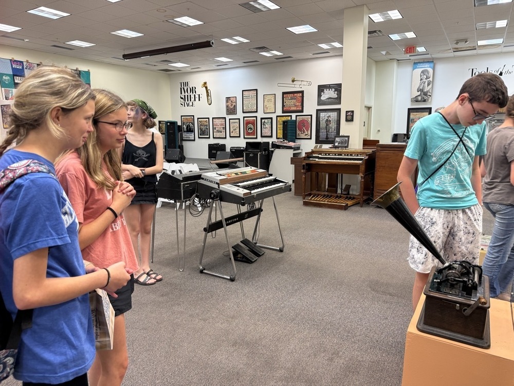 Students reviewing exhibits at the WV Music Hall of Fame