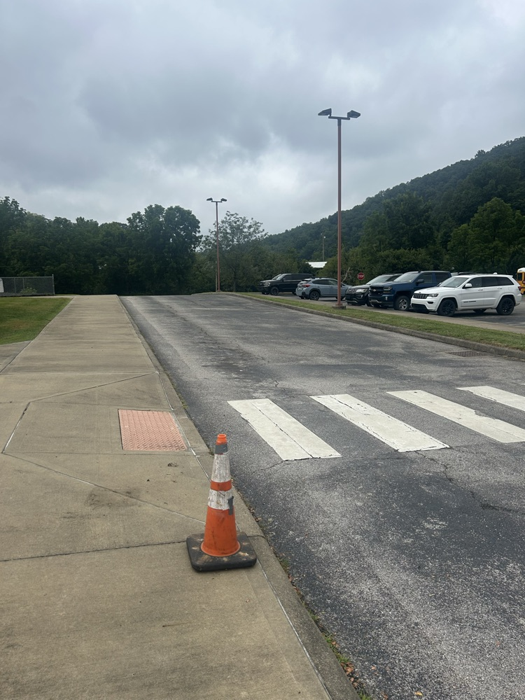 Parking cone beside crosswalk