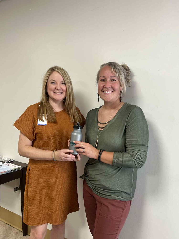 Minnie Hamilton donates water bottles to all Calhoun Schools