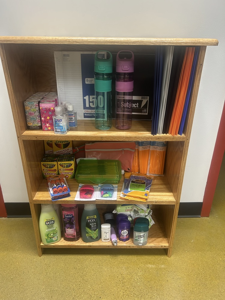 Shelves with school supplies and personal hygiene product