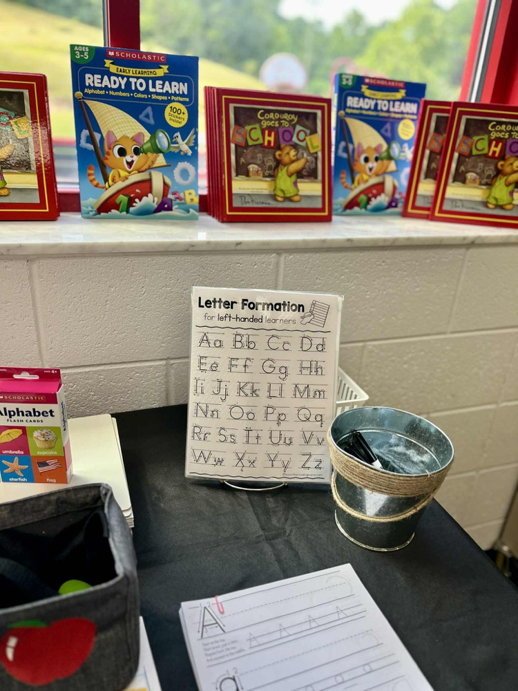 School materials like books and handwriting sheets