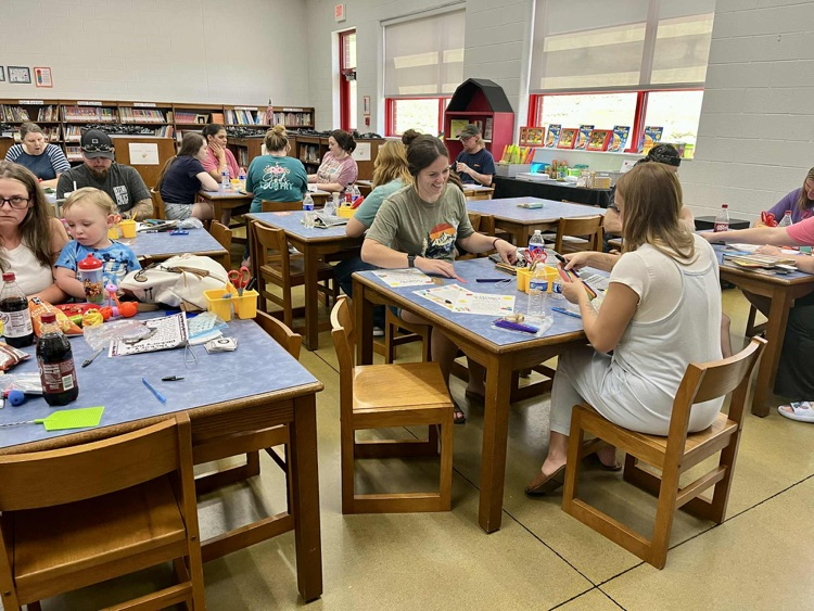 Group of people sitting at tables