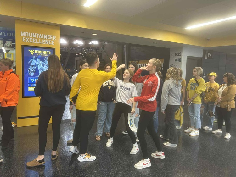 ms girls volleyball team high fives