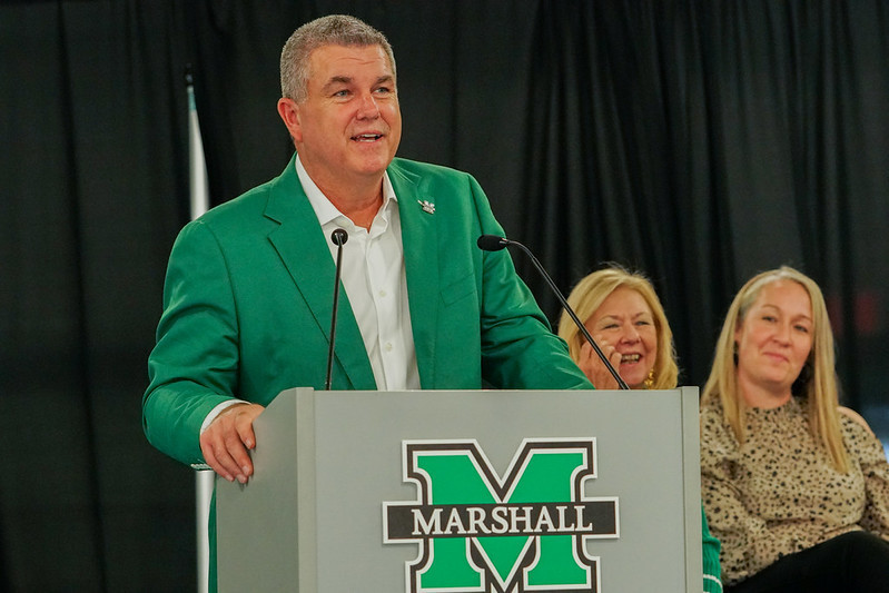 Photo of someone talking at a podium 