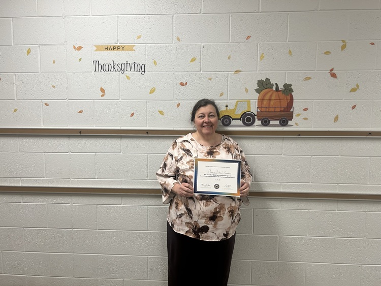 Mrs. Connie Summers with her grant certificate 