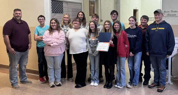 CCS Band with county commissioners for photo