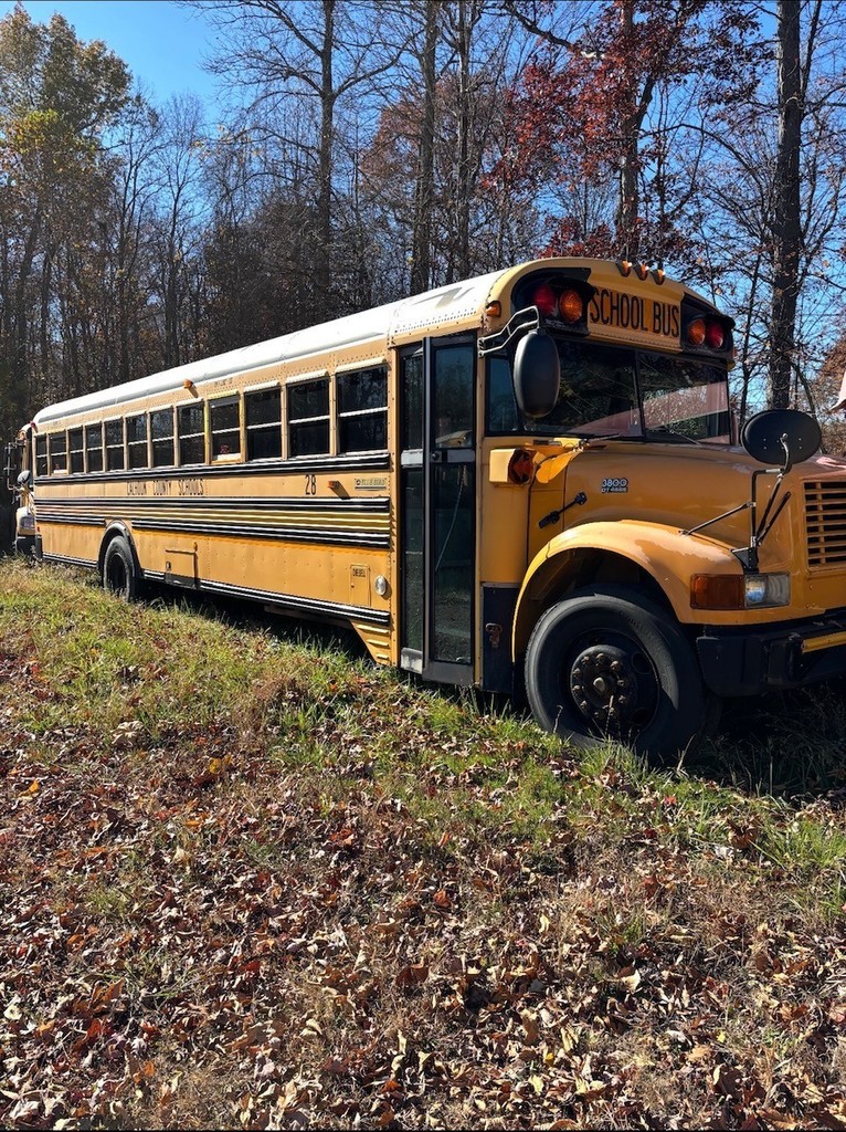 Outside picture of bus 28 passenger side, door and windows