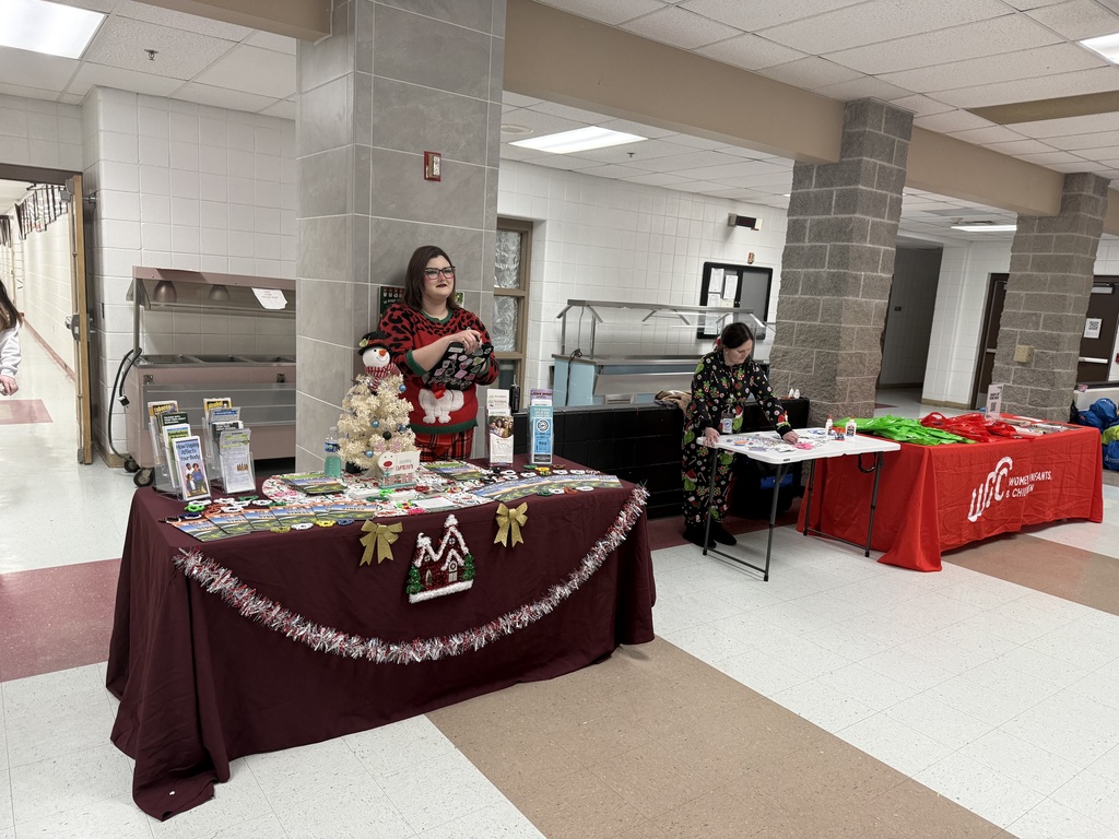 vendors setting up to hand out free giveaways during family engagement event