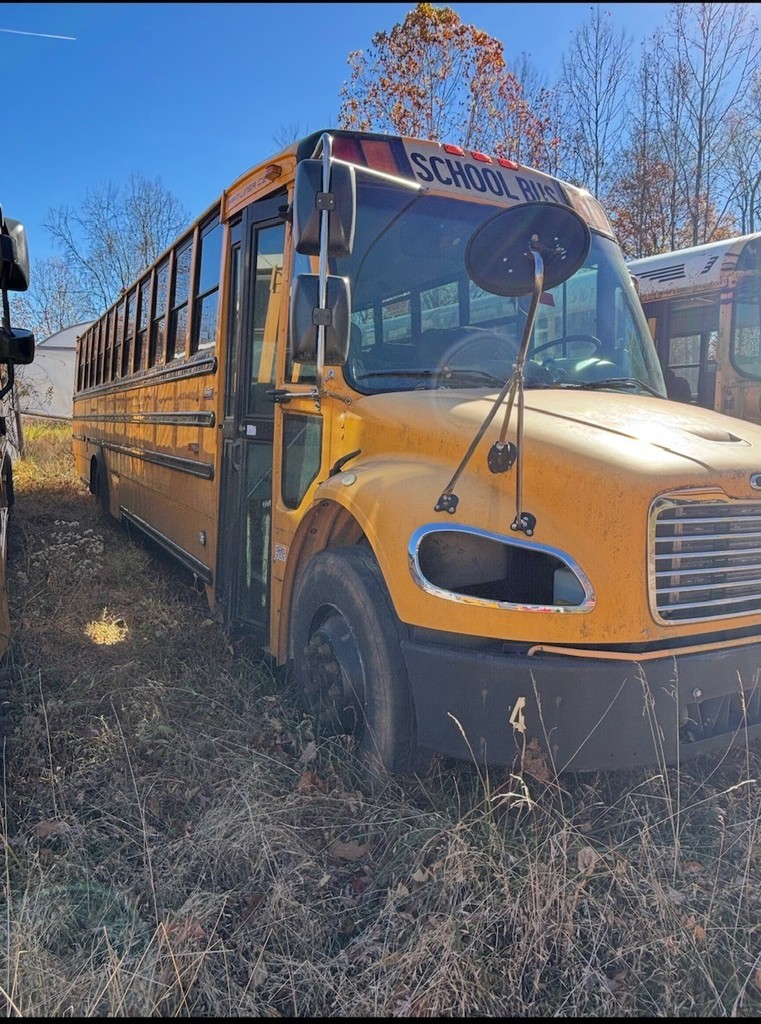 Outside view of bus 4 passenger side with door