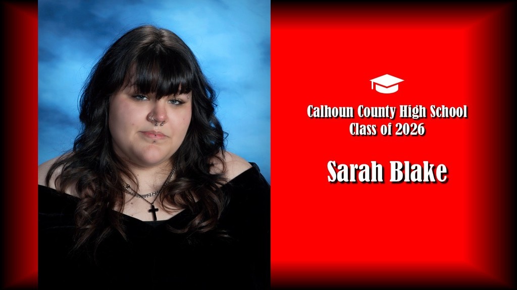 A formal senior portrait layout showing a student with long dark hair and bangs, wearing a black off-the-shoulder top and layered necklaces, posed against a blue studio background on the left. The right side features a bright red panel with a graduation cap icon and white text that reads “Calhoun County High School Class of 2026” and the name “Sarah Blake” in large bold letters. Provide your feedback on BizChat