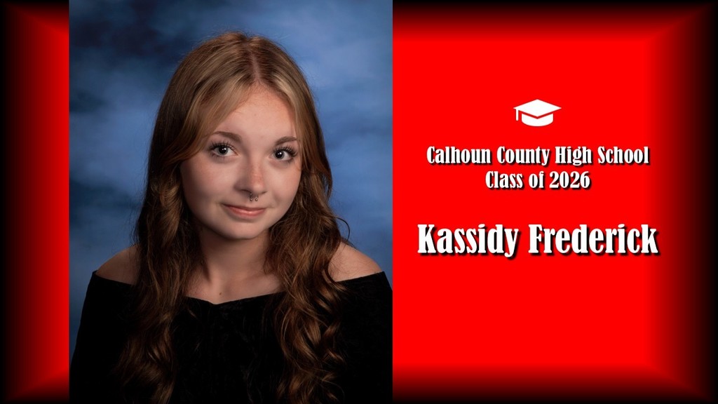 A formal senior portrait layout featuring a student with long wavy hair, wearing a black off-the-shoulder top, posed against a blue studio background on the left. The right side shows a bright red panel with a graduation cap icon and white text that reads “Calhoun County High School Class of 2026” and the name “Kassidy Frederick” in large bold letters.