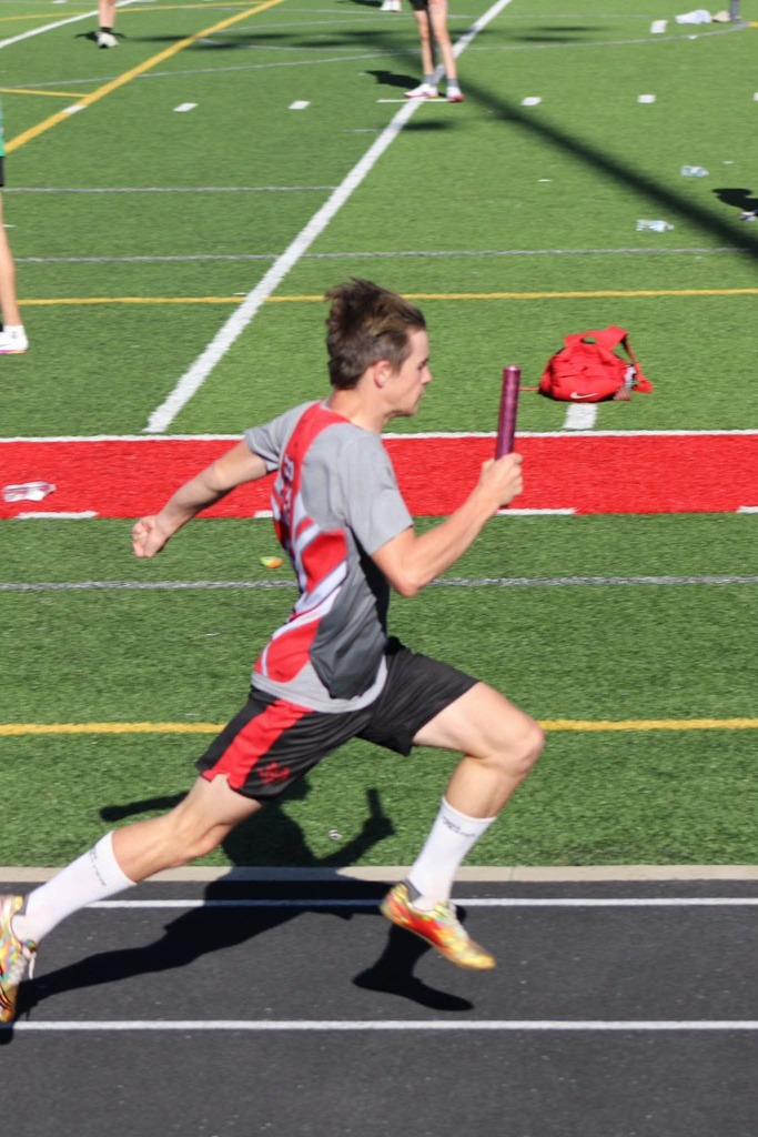 male runner in relay