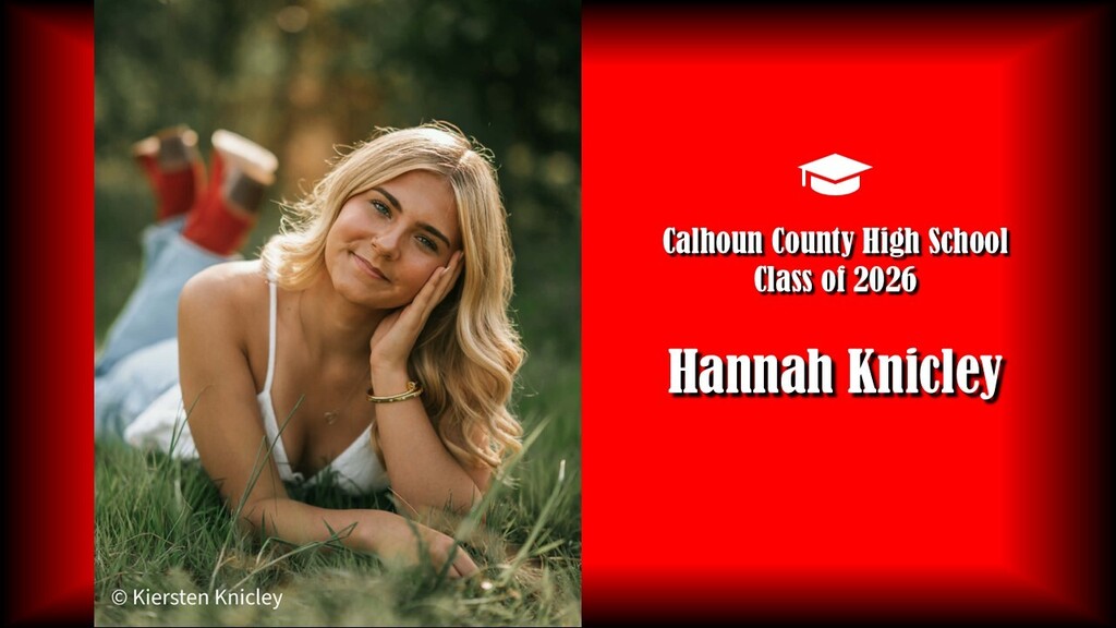 Student in grass with white shirt and red boots.. States it's the class of 2026 from Calhoun County High School. Student name is "Hannah Knicley"