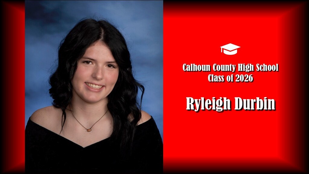 Student wearing black drape with black hair and red background. States it's the class of 2026 from Calhoun County High School. Student name is "Ryleigh Durbin"