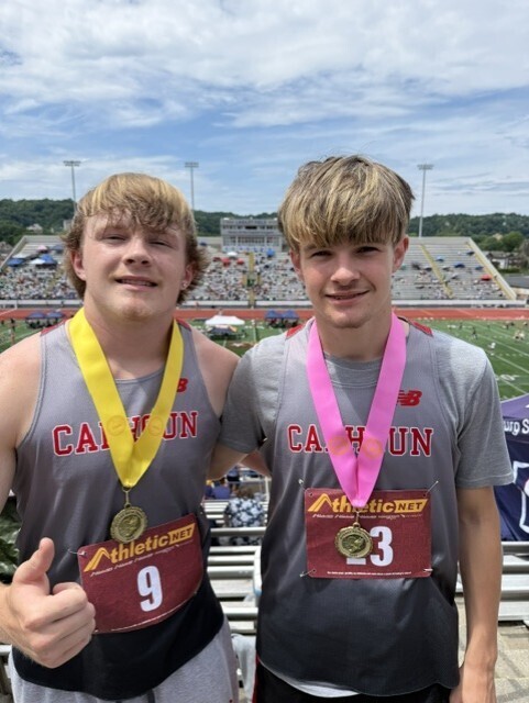 Male track team pse iwth medals