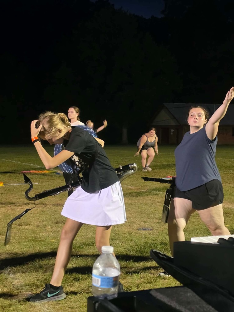 band student strike a pose in the show