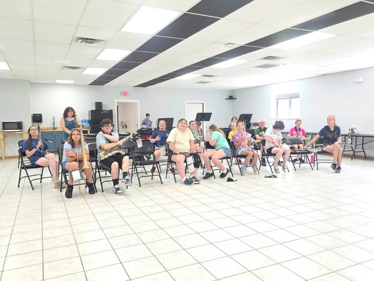students practicing music indoors