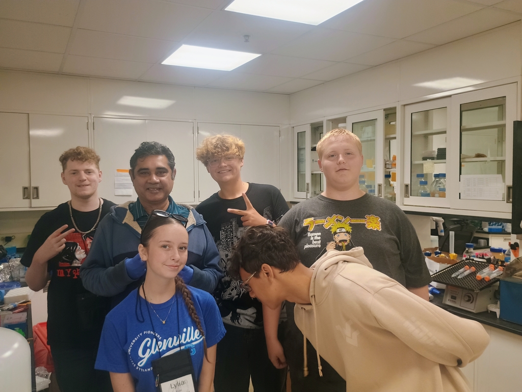 group of students strike a pose