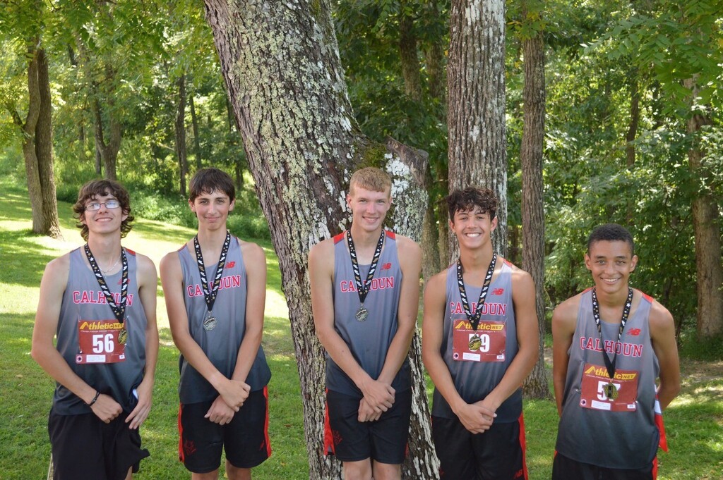 Jackson, Zac, Levi,  Mark and Brandon pose with their XC winnings