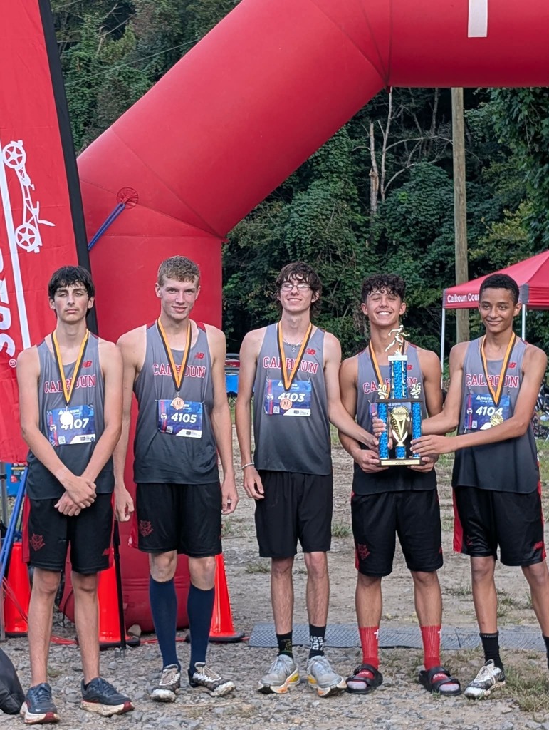 HS boys stand with 1st Place team trophy