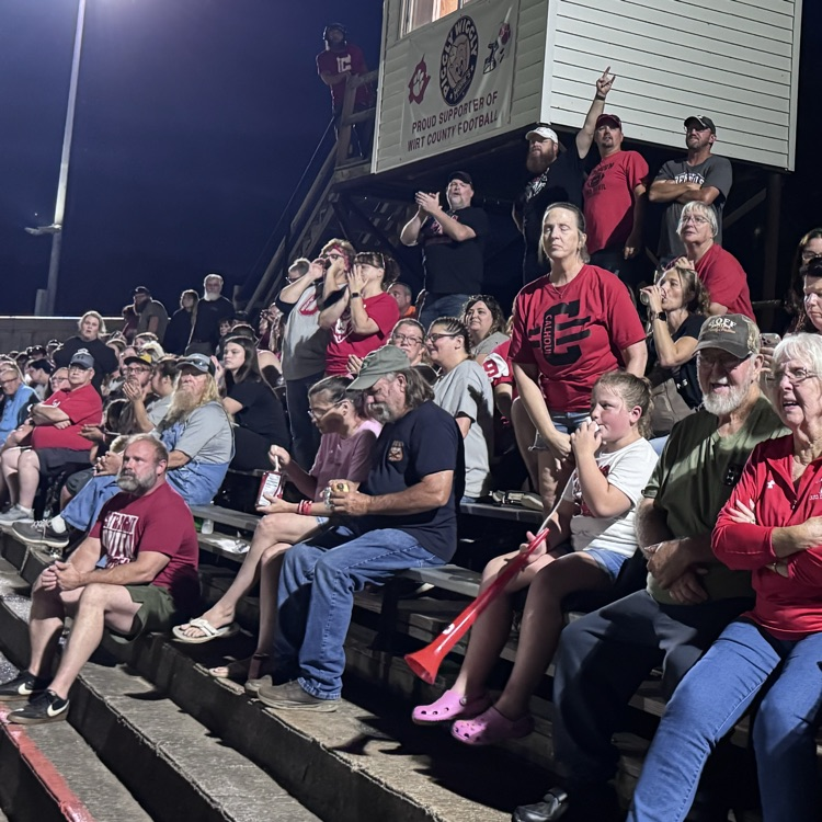fans cheer on the devils in the stands