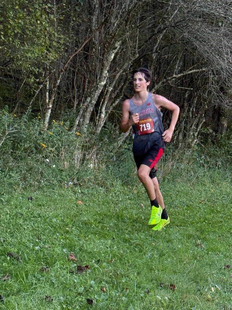 Zach running through the woods