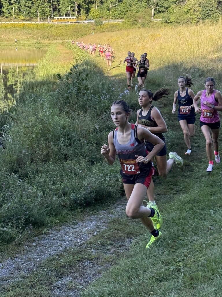 Brooke Tingler leading the pack of runners on the trail. 