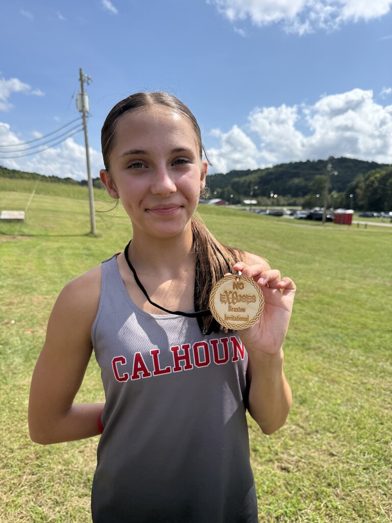 5th place High Schools Race winner, Brook Tingler holds her medal proudly