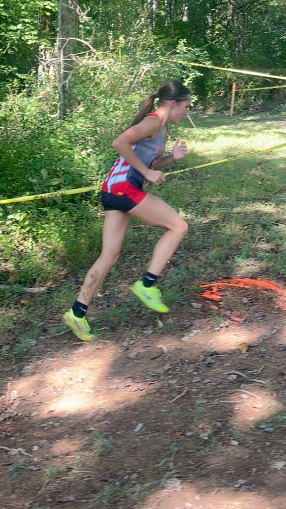 Brooke running uphill, securing her 5th place win. 