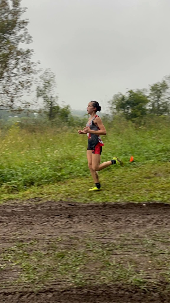 Brooke Tingler running, with a huge lead on her fellow racers. 