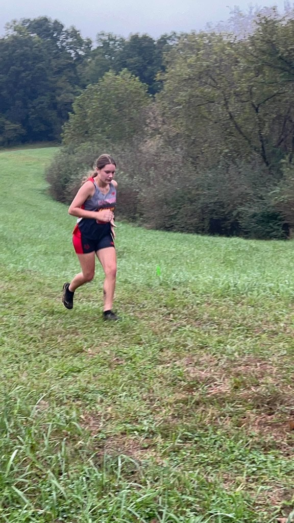 Sands running up the hill solidifying her 8th place win. 