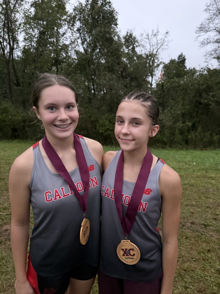 Sands and Tingler pose with their awards. 