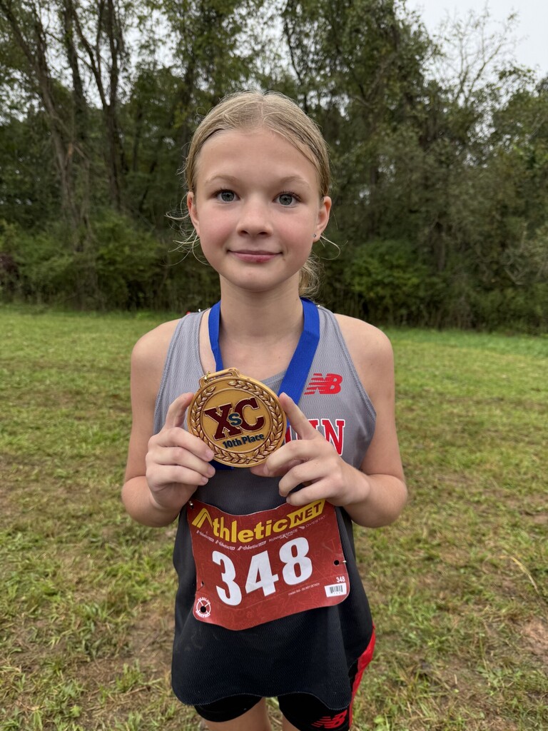 Caldwell poses with her 10th place medal. 