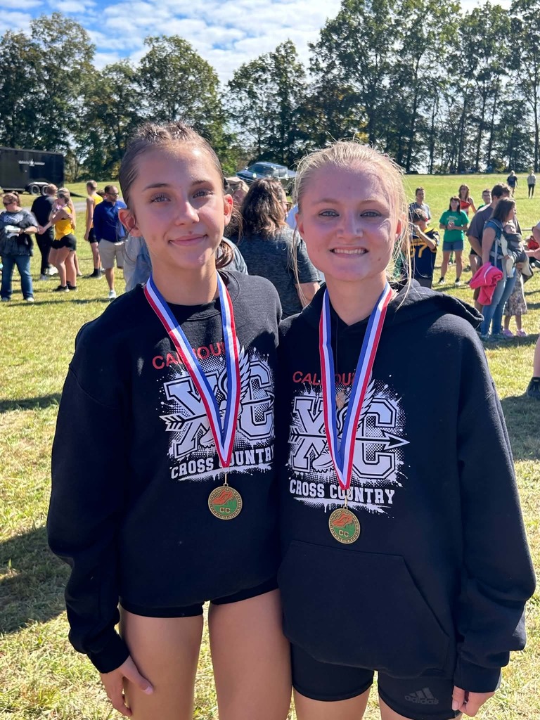 Brooke (L) and Gabbi (R) pase with their awards. 