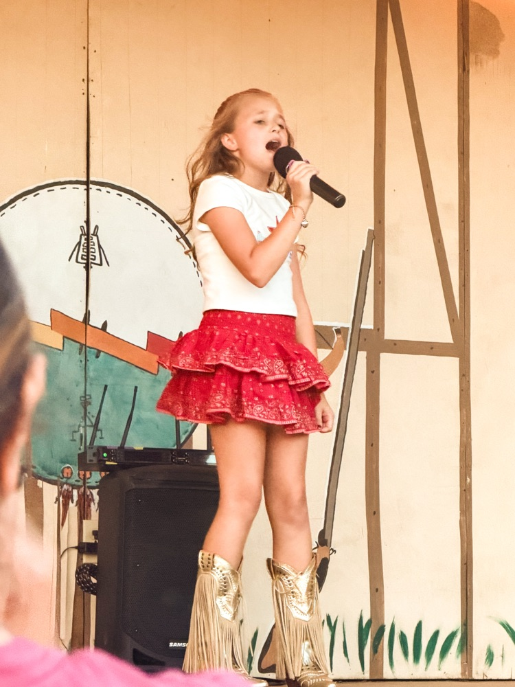 Finley Kate singing Cowboy’s Sweetheart. 