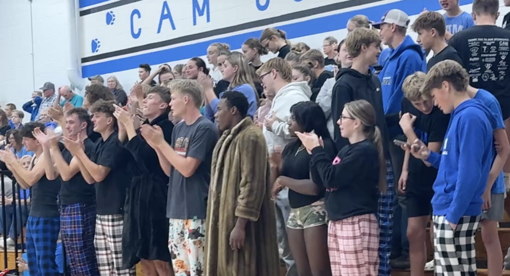 Student Section cheering on Volleyball team