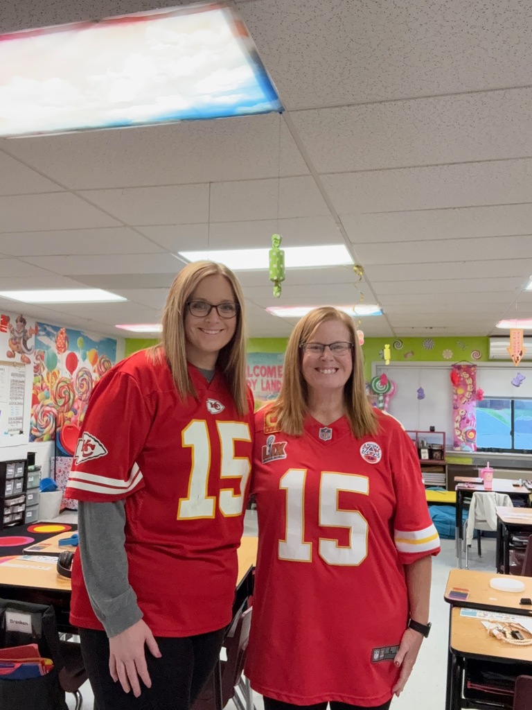 Two teachers wearing #15 Kansas City Chiefs jerseys