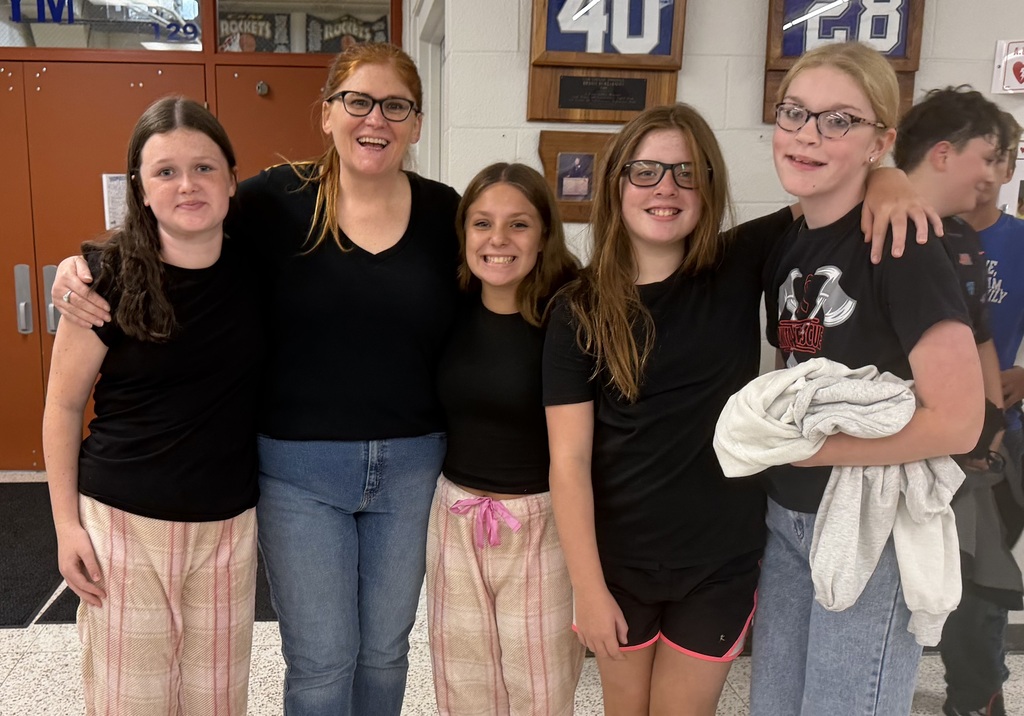 teacher and students looking like twins for "Twin Day" during homecoming week