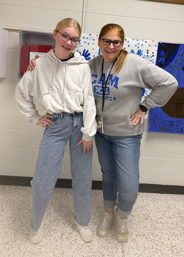 teacher and student looking like twins for "Twin Day" during homecoming week