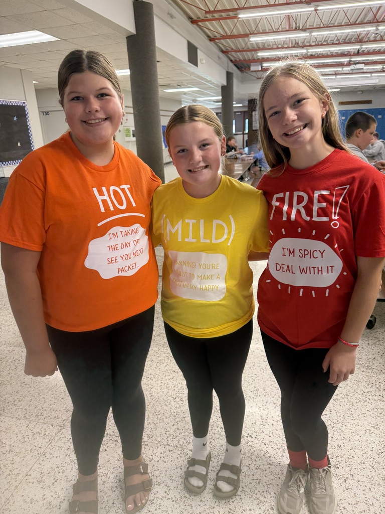 Three students looking like twins for "Twin Day" during homecoming week