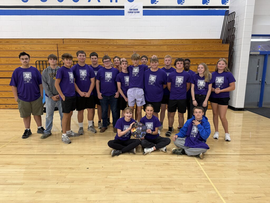 Sophomore class dressed in purple in the gym