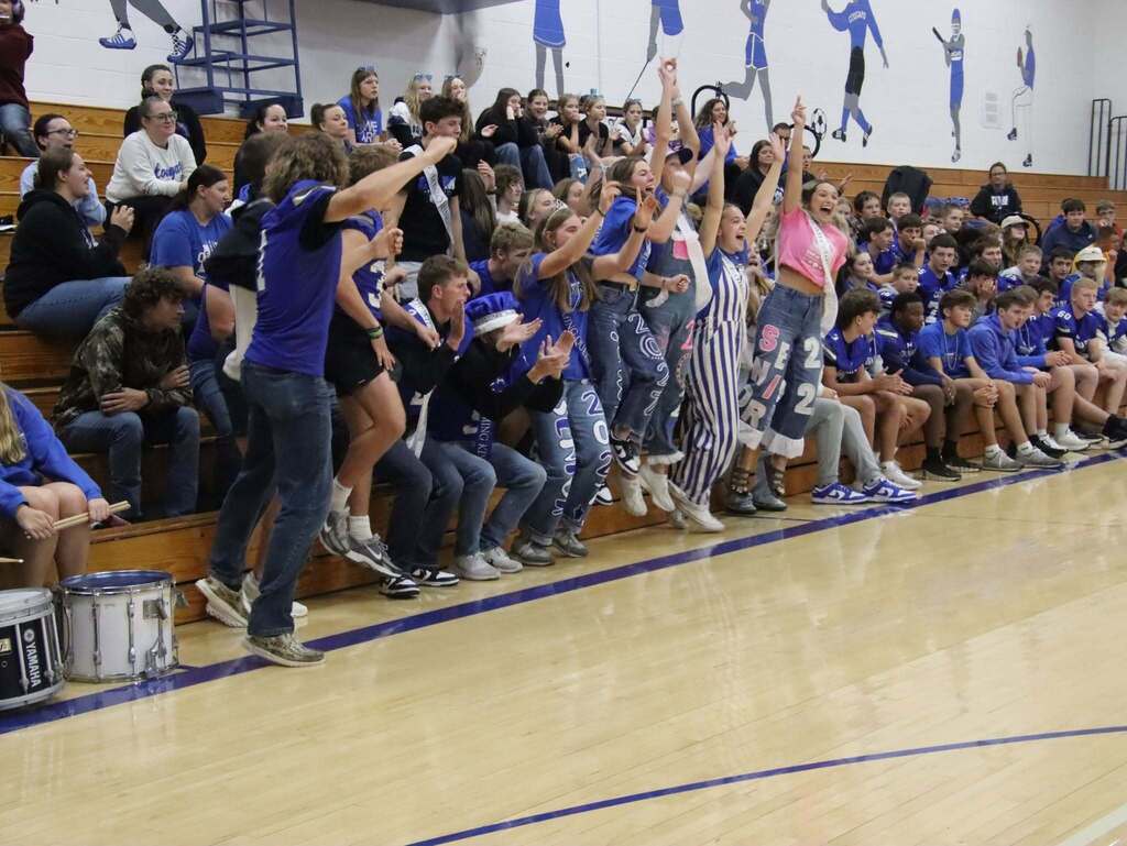 Seniors when they won the spirit stick, jumping up in the gym