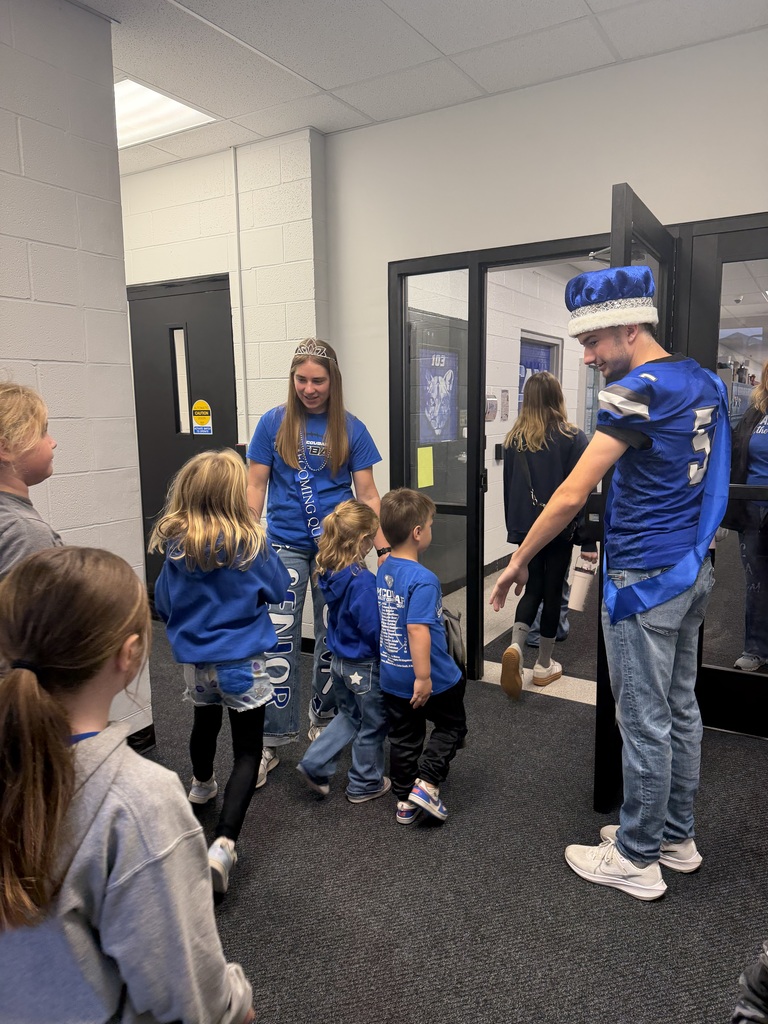 King Carson and Queen Ada greeting the elementary kids on Friday