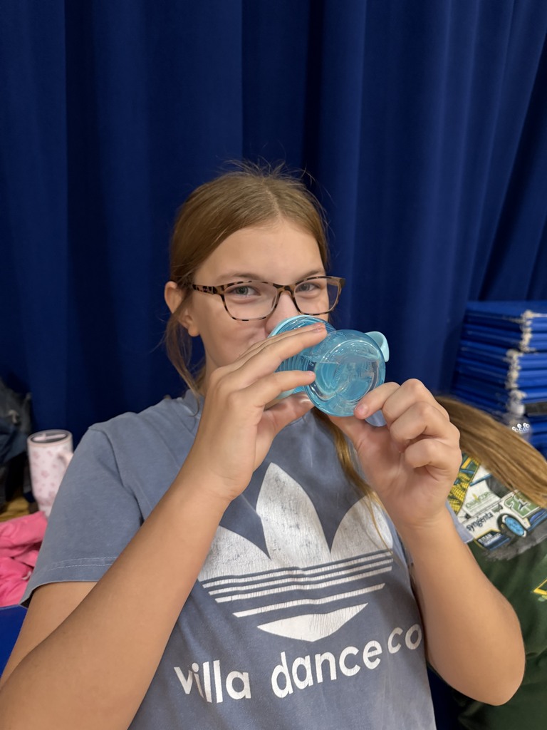cam volleyball player drinking out of a sippy cup